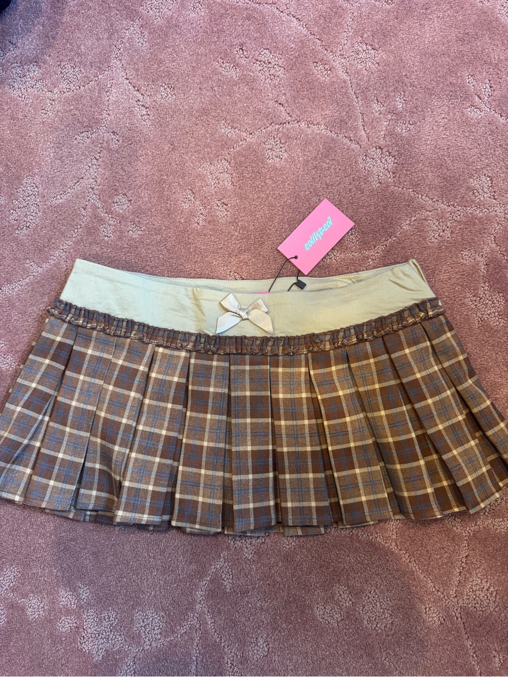 Edikted Brown Plaid Pleated Mini Skirt with Cream Waistband and Bow Accent